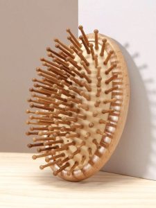 Experience the gentle art of grooming with our Wooden Hair Comb. Handcrafted for smoothness, it reduces static and snags, enhancing natural shine for healthier-looking hair.
